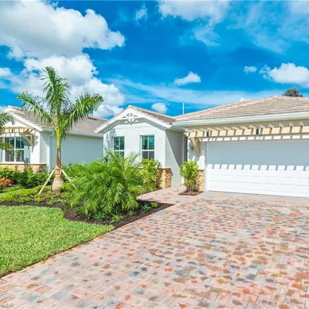 Rent this 4 bed house on 701 Tamarind Court in Pelican Bay, FL 34108