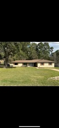 Buy this 4 bed house on 923 McLeod Drive in Huntsville, TX 77320