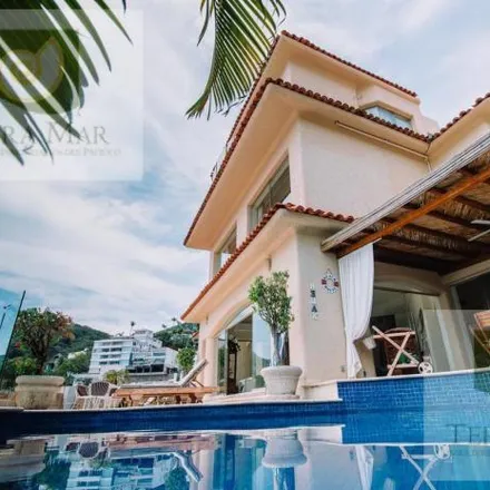 Rent this 5 bed house on Cerrada Caracol in Playa Guitarrón, 39300 Acapulco