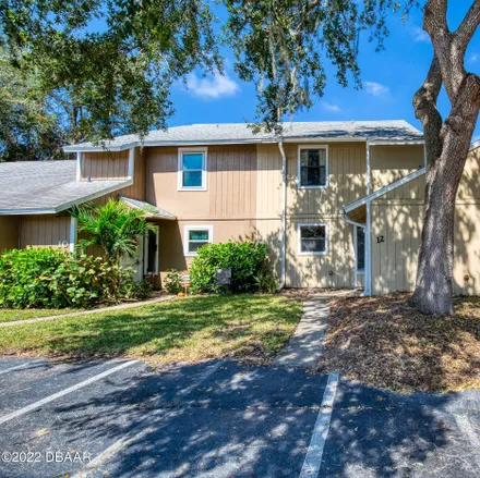 Buy this 2 bed townhouse on 12 Tomoka Meadows Boulevard in Ormond Beach, FL 32174