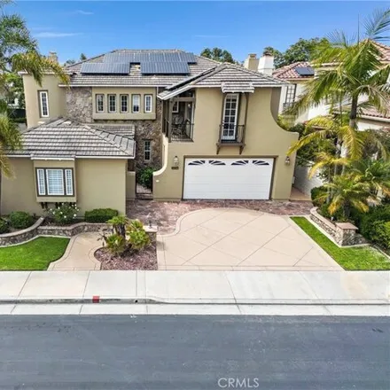 Buy this 4 bed house on 6467 Frampton Circle in Huntington Beach, CA 92648