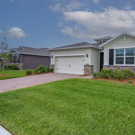 Buy this 4 bed house on Hawk River Drive Southwest in Florida Ridge, FL 34951