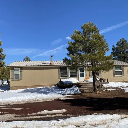 Buy this studio apartment on Purple Heart Trail in Williams City Limits, AZ 86002