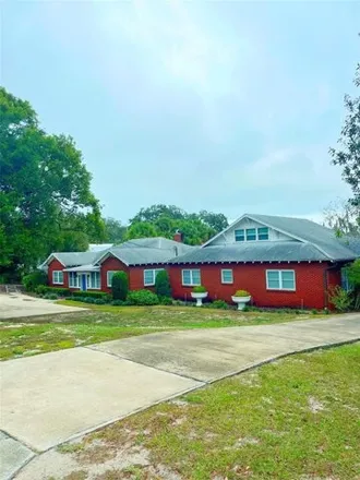 Buy this 6 bed house on 1140 West Lake Otis Drive Southeast in Winter Haven, FL 33880