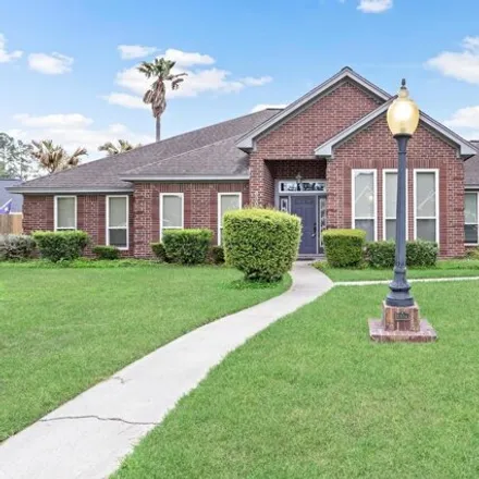 Buy this 4 bed house on 2898 East Tanager Trail in Orange, TX 77632