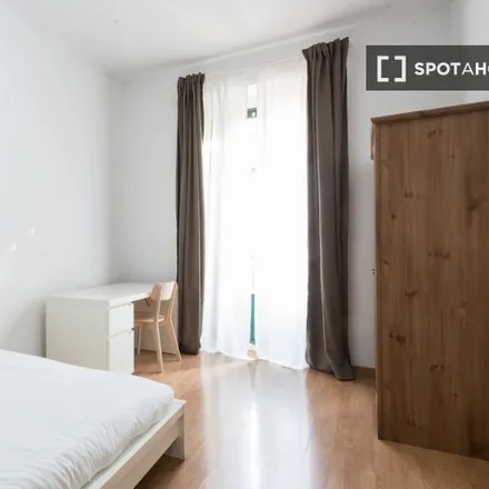 Rent this 8 bed room on Plaza de Raffaella Carrà in 28004 Madrid, Spain