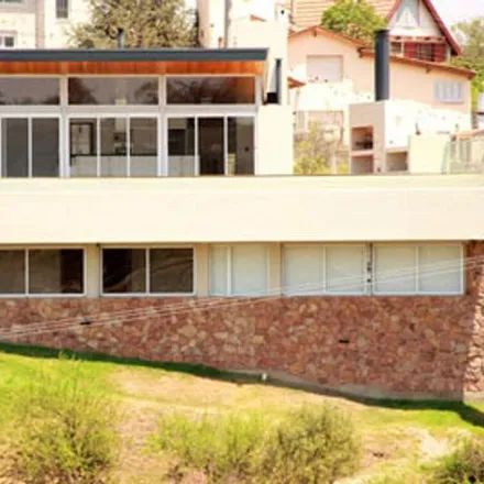 Buy this 4 bed house on Jorge Furt in Departamento Punilla, Villa Carlos Paz
