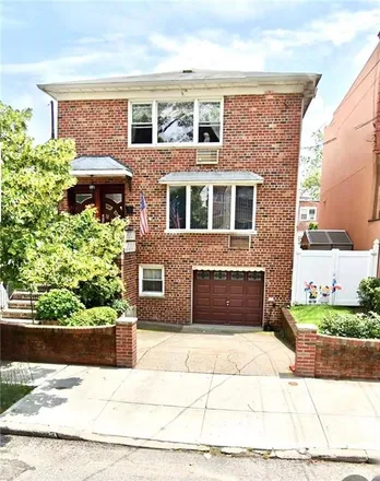 Buy this 8 bed townhouse on 107 Bay 11th Street in New York, NY 11228