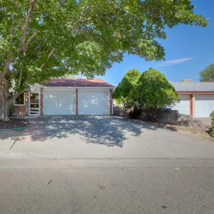 Buy this 4 bed house on 7199 Marble Avenue Northeast in Albuquerque, NM 87110