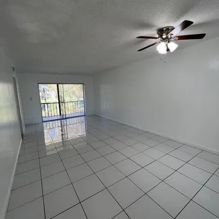 Rent this 2 bed apartment on 7965 Fairview Drive in Tamarac, FL 33321