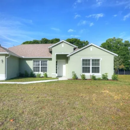 Rent this 3 bed house on 8165 104th Court in Vero Lake Estates, Indian River County