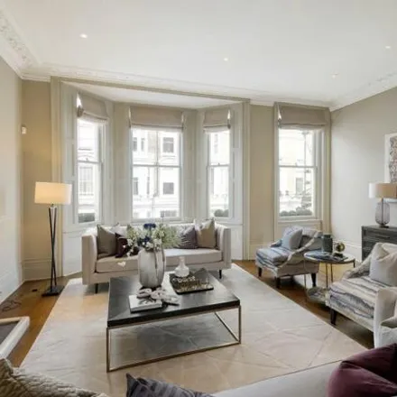 Buy this 5 bed townhouse on 24 Stafford Terrace in London, W8 7BG
