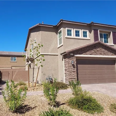 Rent this 4 bed townhouse on 6943 Denio Island Street in North Las Vegas, NV 89084