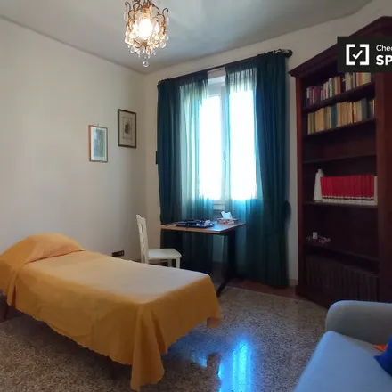 Rent this 3 bed room on La Cornucopia Bistrot in Via Magnagrecia, 00183 Rome RM