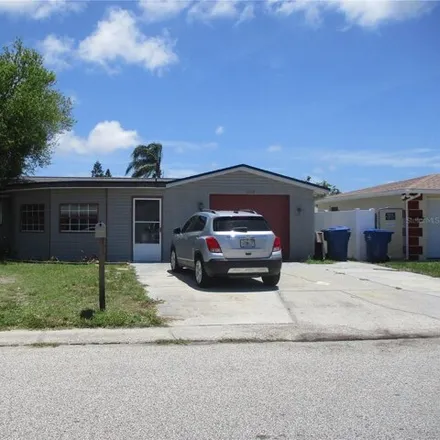 Buy this 3 bed house on 3336 Trask Drive in Holiday, FL 34691