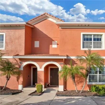 Buy this 4 bed townhouse on 8941 Candy Palm Rd in Kissimmee, Florida