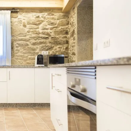 Rent this 4 bed townhouse on Santiago de Compostela in Galicia, Spain