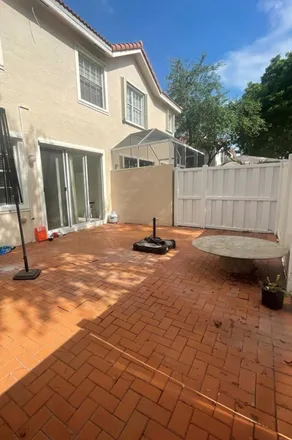 Rent this 3 bed townhouse on 4242 SW 124th Way in Miramar, FL 33027