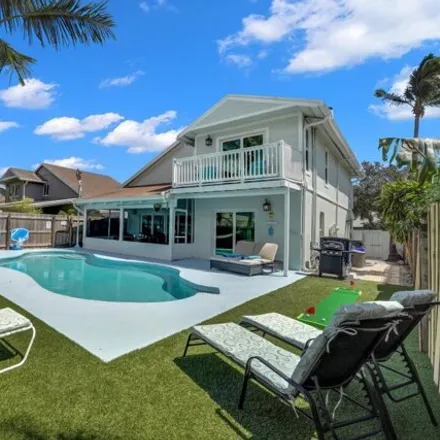 Rent this 4 bed house on 2447 Zeder Avenue in Delray Beach, FL 33444