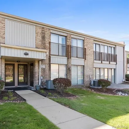 Buy this 2 bed condo on Brashear Towers Senior Apartments in University Park Drive, Livonia