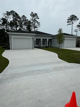 Rent this 3 bed house on 44 Red Mill Drive in Palm Coast, FL 32164