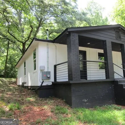 Buy this 3 bed house on 3236 Jonesboro Rd Se in Atlanta, Georgia