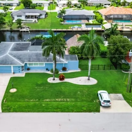 Buy this 4 bed house on 2818 SE 17th Pl in Cape Coral, Florida