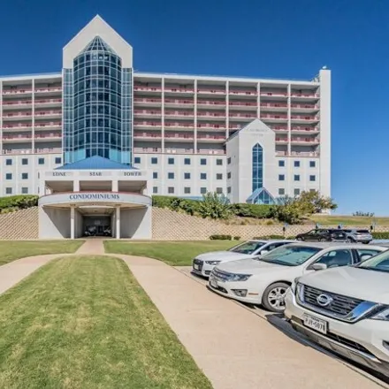 Rent this 2 bed condo on Lone Star Tower in Victory Circle, Fort Worth