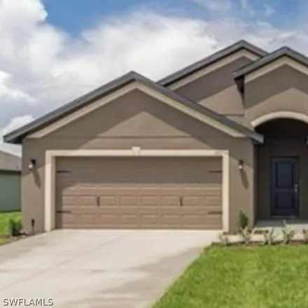 Buy this 4 bed house on 427 Shadow Lakes Drive in Lehigh Acres, FL 33974