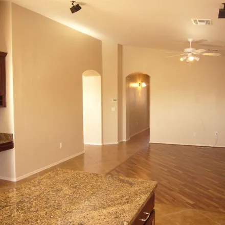 Rent this 4 bed apartment on 12409 North Stone Ring Drive in Marana, AZ 85653