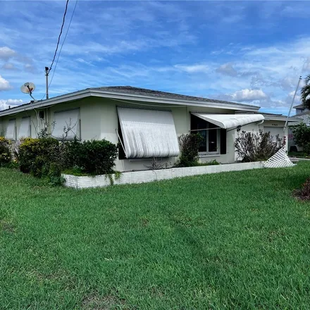 Buy this 3 bed house on 135 Southwest 57th Street in Cape Coral, FL 33914