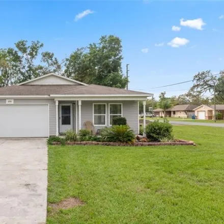 Buy this 4 bed house on 6385 Airmont Drive in Spring Hill, FL 34606