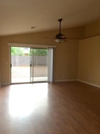 Rent this 3 bed house on 1067 West Tremaine Avenue in Gilbert, AZ 85233