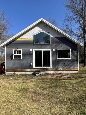 Buy this 2 bed house on 9049 13 Mile Road in Martiny Township, MI 49332