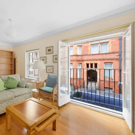 Buy this 3 bed townhouse on 78 Chenies Mews in London, WC1E 6HU