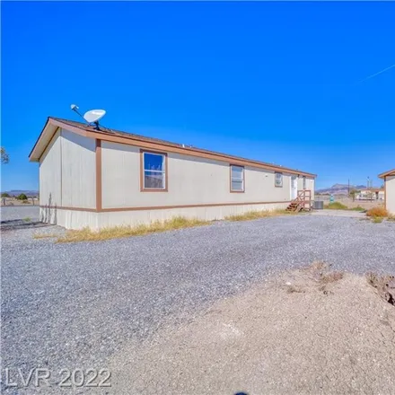 Buy this 3 bed house on West Irons Street in Pahrump, NV 89060