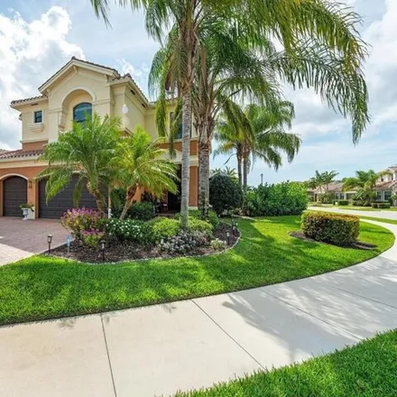 Buy this 5 bed house on 13793 Callisto Avenue in Collier County, FL 34109