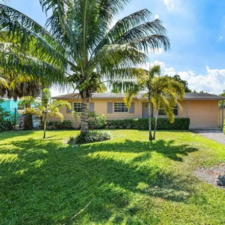 Buy this 4 bed house on 913 Caroline Avenue in Lake Belvedere Estates, Palm Beach County