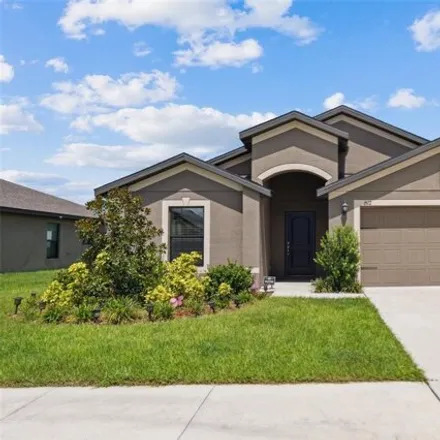 Buy this 4 bed house on 1512 Swan Lake Cir in Dundee, Florida