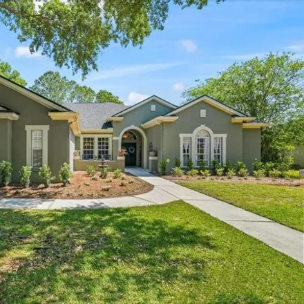Buy this 4 bed house on 5525 Garden Arbor Drive in Hillsborough County, FL 33558