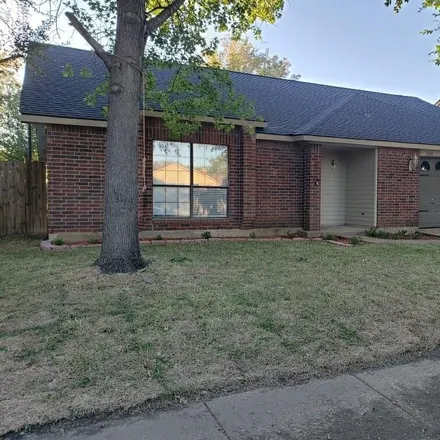 Rent this 4 bed house on 5204 Redwater Drive in Arlington, TX 76018