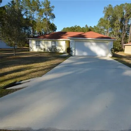 Rent this 3 bed house on 50 Red Mill Drive in Palm Coast, FL 32164