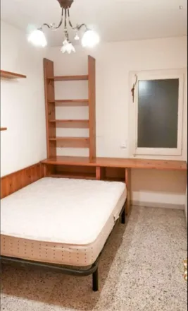 Rent this 3 bed room on Basar Orient in Carrer de Casteràs, 40