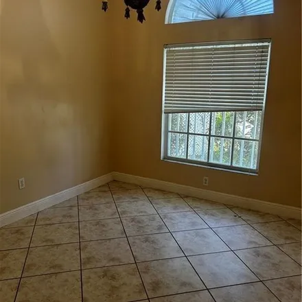 Rent this 3 bed apartment on East 18th Street in Lehigh Acres, FL 33972