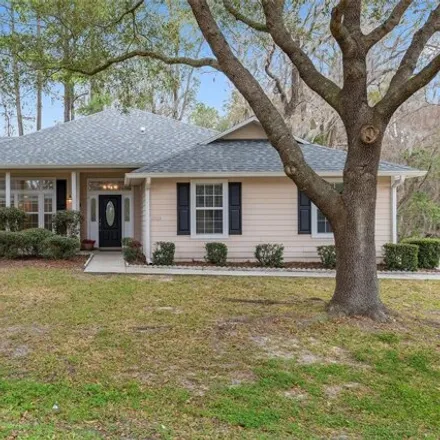 Buy this 4 bed house on 12049 Northwest 69 Way in Alachua, FL 32615