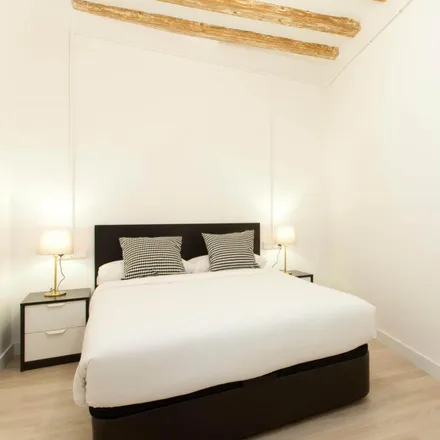 Rent this 4 bed apartment on Home on Earth in Carrer de l'Hospital, 76