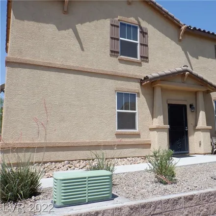 Rent this 4 bed house on 974 Wembly Hills Avenue in Henderson, NV 89011