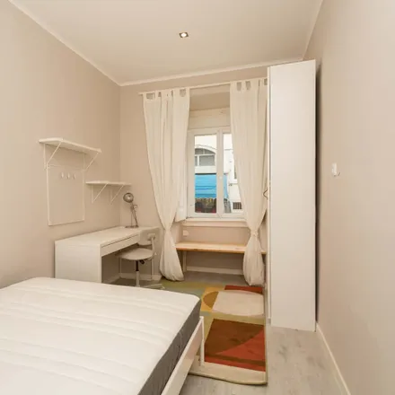 Rent this 7 bed room on Rua Carrilho Videira in 1170-347 Lisbon, Portugal