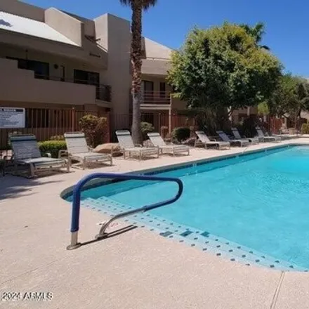 Rent this 2 bed apartment on 4435 East Paradise Village Parkway South in Phoenix, AZ 85032