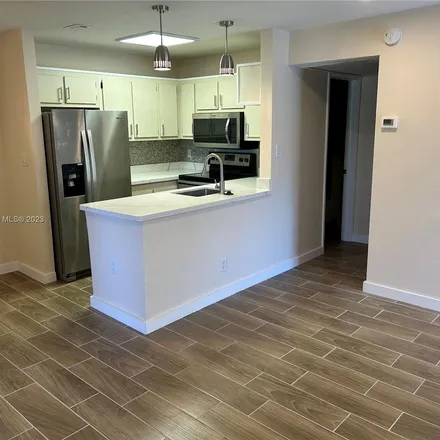 Rent this 2 bed apartment on 10024 Winding Lakes Road in Sunrise, FL 33351